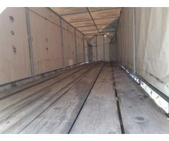 porte 2 voitures bâchée